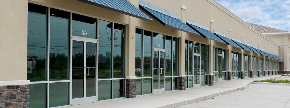 a picture of a line of empty strip mall offices